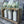 Load image into Gallery viewer, 114-12 Vintage Bottle Centrepieces - Rafter Diamond W - Painted Door on Main
